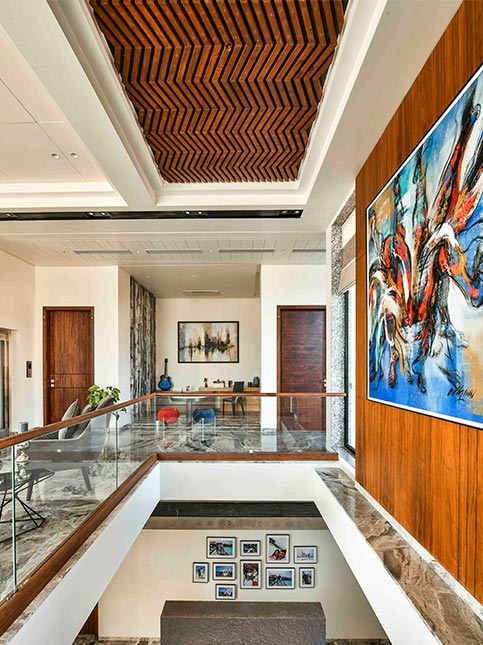 Tan brown wooden false ceiling tile design with zigzag pattern - Beautiful Homes